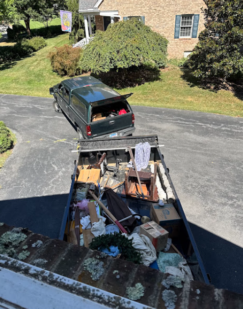Truck loaded with hauled junk